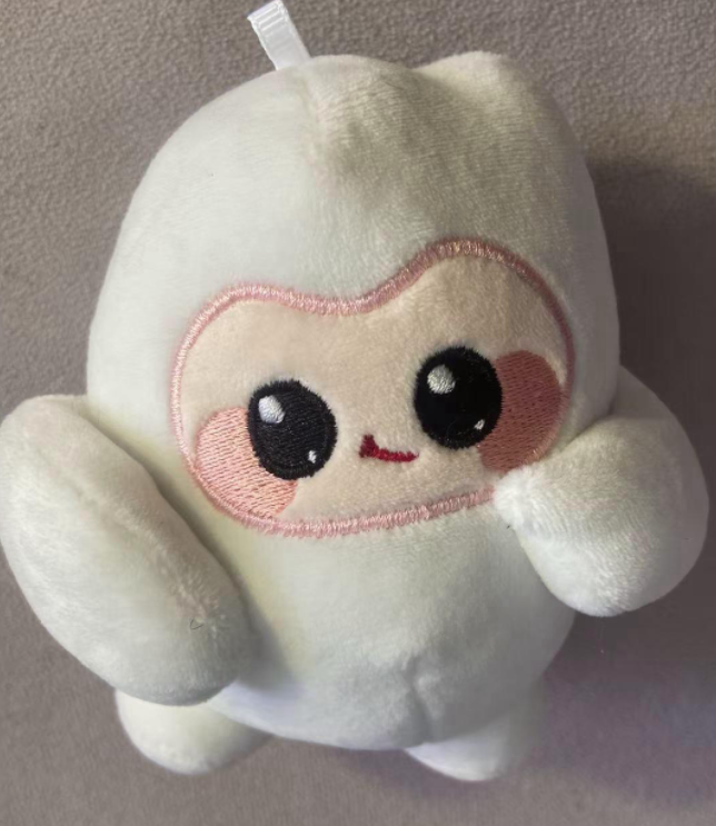 a custom corporate mascot plush toy with a rounded and adorable design.